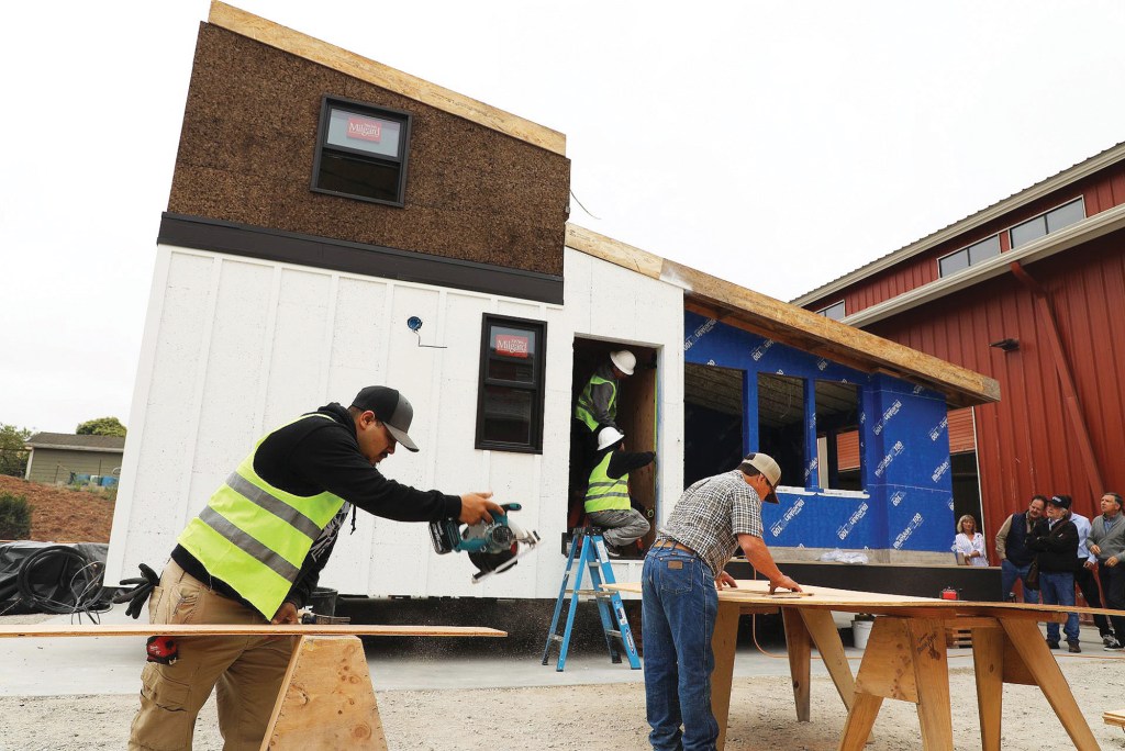 The layout of the 847-square-foot home built by Rancho Cielo Construction Academy features two convertible rooms, an upstairs loft, a vaulted living-room ceiling, a kitchen (designed with guidance from students in Rancho Cielo’s culinary arts program), and screened-in front porch.