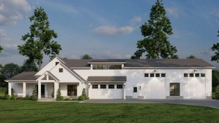 Large barndominium plan, front exterior. See details at Houseplans.