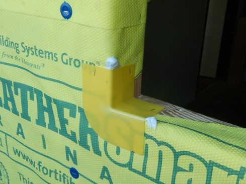 Step 2 (cont.). Install Plastic Sill Corners.Staple the flashing corners in place at both sides of sill. The corners help seal the sill’s three-directional corner from pinhole openings in the membrane flashing, as well as providing protection in case the window is roughly slammed into to place.