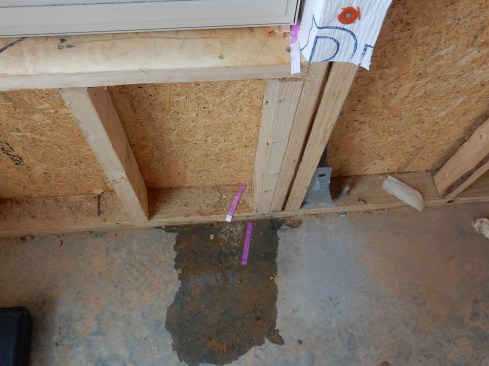 This photo is the interior view of figure 1. When there are adhesion problems after the nailing flange has been covered with the SAF, there is a strong likelihood that water will migrate to the cracks and holes, and then enter the building. I’ve seen this frequently when performing water tests. We regularly water-test windows and wall systems using ASTM E 1105 as our guidelines. We also use AAMA 502 and AAMA 511.