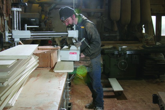 Lock miters are strong, fast to cut, and easy to assemble. Here Jed Dixon cuts lock miters with a shaper and a power feeder to ensure that all the pieces are cut with precision.