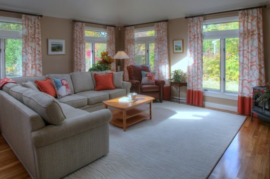To create the best impression for prospective spec-house buyers, site the house and arrange the floor plan so that public spaces inside the house look out on natural settings instead of looking at neighboring houses. Ideally, the views from the living room and dining room should be of water or trees.