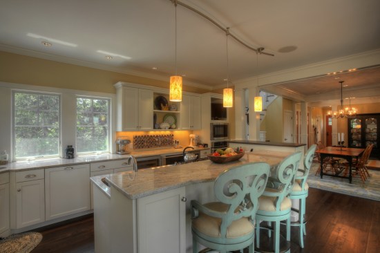 Pay special attention to kitchen lighting. If you install pendants over an island, make them special. An extra $50 or $100 spent here can translate to thousands in the perceived value of the home.