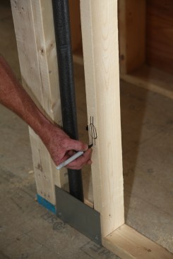 A circle with two lines indicates a receptacle location.