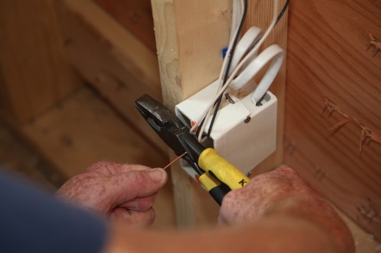 The proper size copper crimp sleeve slides onto the twist and pliers crimp the sleeve. 
