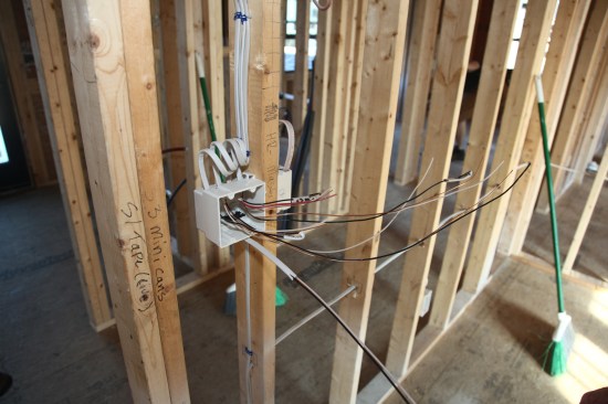 As the cables are fed into the box, they may look like an unorganized mass of wire. But with the labels and the wire colors, sorting them out is easy.