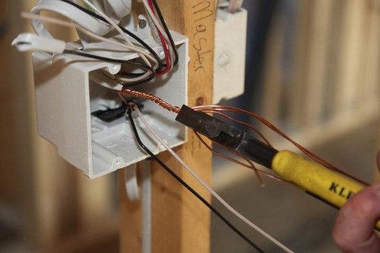 As before, pliers finish the twist tightening the bundle together. 