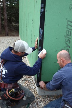 Working the plastic spreader in a diagonal fashion helps to work out any air bubbles while creating the initial adhesion.