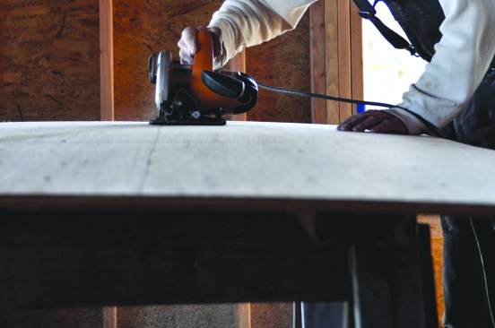The best cutting station for sheet goods  consists of two sturdy sawhorses  made of 2-bys with a pair of sacrificial  studs between them.