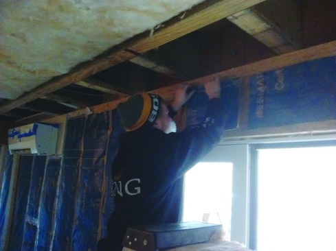 Minimizing the size of headers means increased insulation in the wall. A rim-joist header allows full-depth wall insulation in the spaces above a door opening, where there would have been solid lumber years ago.