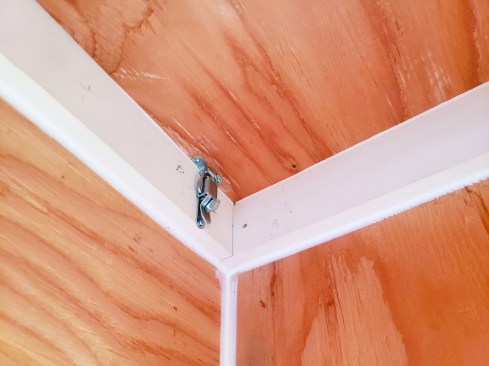 Spring-loaded catches hold the airtight panel in place.