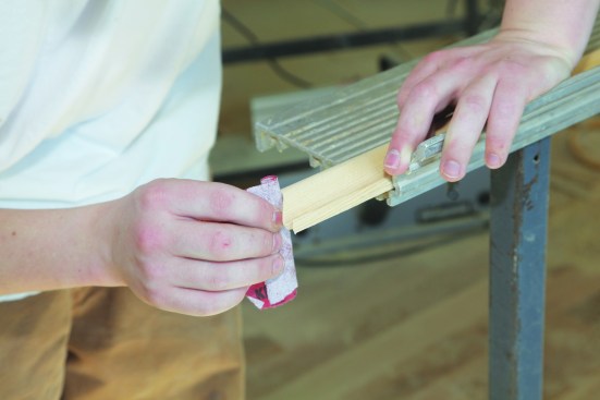 Sanding fine-tunes the cope.