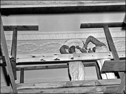 Plasterers cut ornamental plaster from the East Room ceiling. The salvaged plaster flatwork samples were used to make molds for replacement pieces. Large decorative moldings, such as ceiling medallions and cornices, were similarly salvaged and recreated as needed.