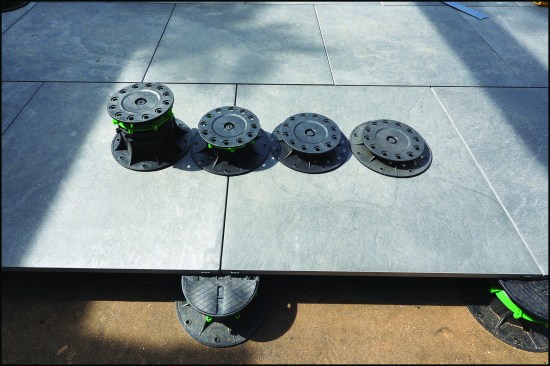 Most pedestals are adjustable and are supplied by their manufacturers in varying heights depending on the roof configuration.