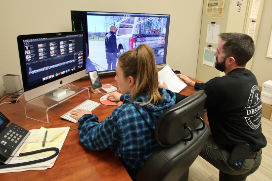 Project lead manager Mike Whalen and marketing director Andalee Powers review a recently filmed training video “Trucks/Trailers & DOT Safety.” The Swiss army knife of DBS Remodel, Andalee produces all in-house videos, which are filmed with a smartphone. Crew members are miked up with Røde wireless mics, and the video footage is edited in Final Cut Pro. Some tests—for example, on how to install a ladder properly—require learners to shoot video of themselves, which they submit to the leads for their critique.