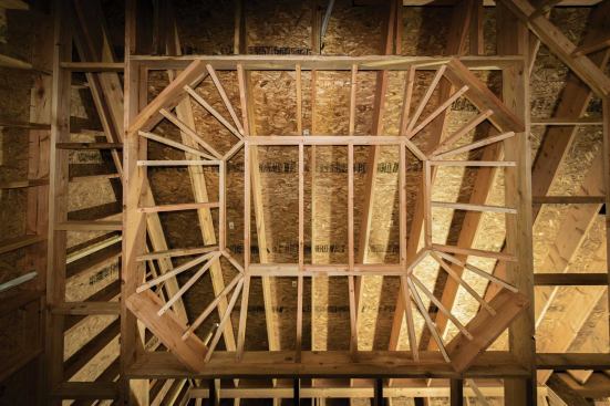 On a master bathroom project, the author decided to frame the tray ceiling octagonally rather than as a rectangle.