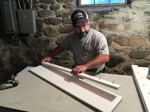 After cutting the sill stock to a rough length, I glued and screwed a 2-inch-wide piece onto the outer edge to double the thickness where the sill extended beyond the foundation.
