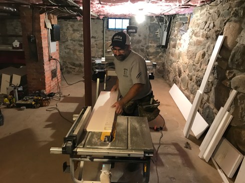After gluing the two pieces together, I ran the assembly through a table saw with the blade set at a 12-degree angle to make the outer edge plumb.