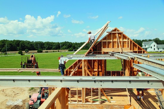 On the front of the house, they leaned the rafters up, closer to their final positions.