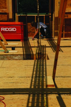 The crew member at the other end of the tape held it at 1 foot for the measurement.