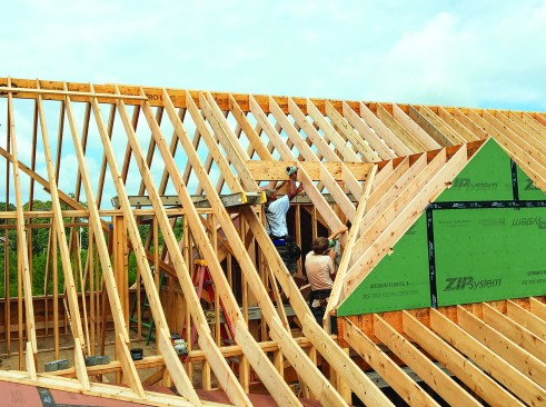The intersecting gable dormers complete the roof framing.