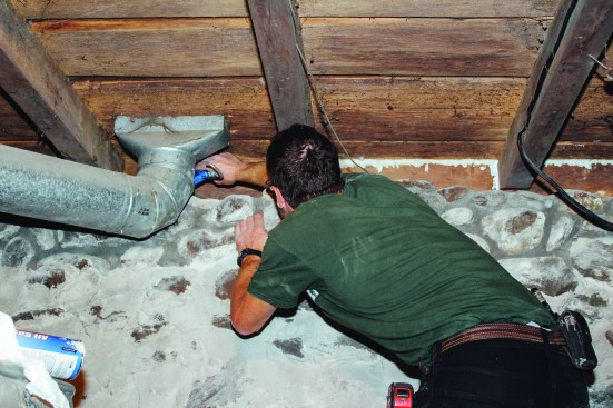 A combination of sealant and spray foam air-sealed the gaps between framing members.