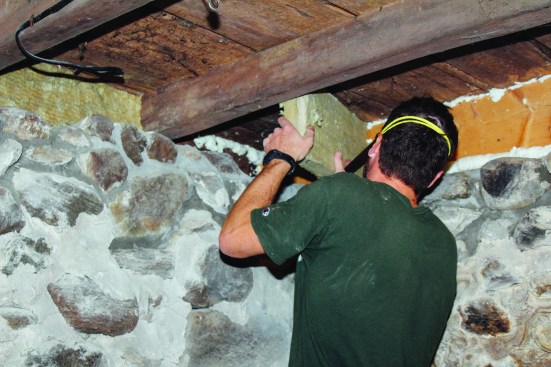 Layers of Roxul insulation were easy to cut and snug into tight joist bays ...
