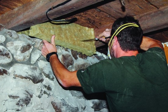 ... and around the irregular fieldstone and handhewn framing.