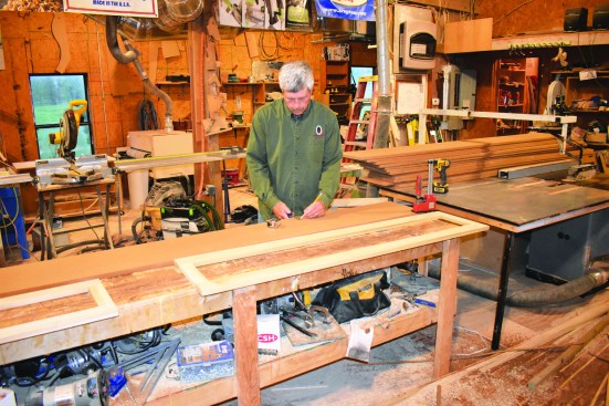 After ripping sheets of exterior MDF to width, the author built wooden templates, laid out their position on the column faces.