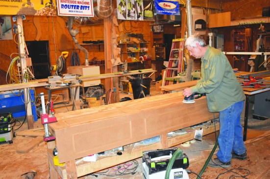 After removing the clamps, the author cleaned up the joints with a belt sander.