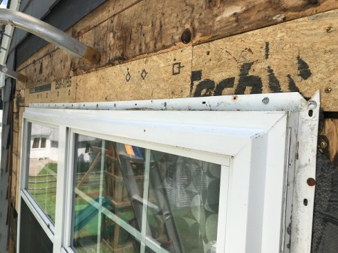 The original board sheathing made it easy to replace the rotten sections. To keep from disturbing the interior finish, the author elected not to completely remove and replace the window. Instead he refastened the flange with 2 1/4-inch hot dipped galvanized roofing nails.
