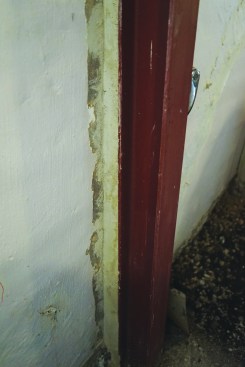 They then packed structural mortar into the gaps, making sure to fill them completely.