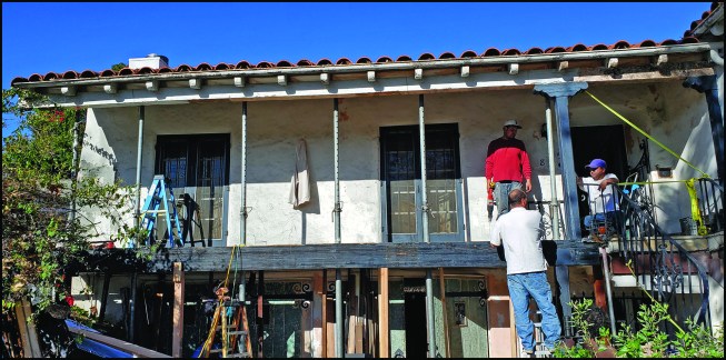 The author’s crew begins removing a rotted beam on a historic circa 1929 California bungalow.