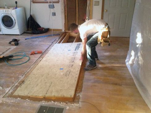 Then glued and nailed Advantech floor sheathing over the opening.