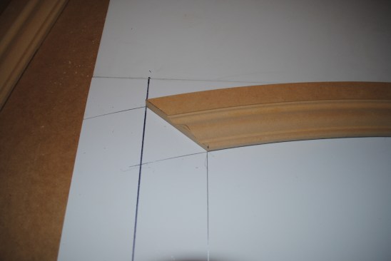 After cutting the miter set the arch back in place.