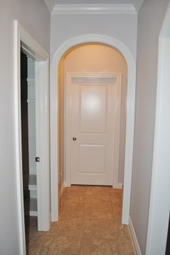 An elliptical arch needs less ceiling height than the circle top arch. Both attach to square cuts on side-jamb trim.