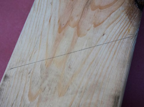 Birdsmouth. Place a square at the 82 3/4 -inch mark, and draw another plumb line, parallel to the top cut. This line represents the shoulder of the birdsmouth.