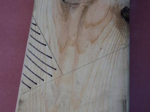 But the birdsmouth doesn’t need to have full bearing. On a steeper roof, it will be shorter; on a shallower roof, the seat cut will be longer. The birdsmouth (the area identified above with black hatch marks) can be cut now, but I usually wait until I have laid out the tail cuts.