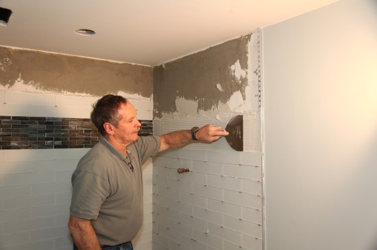 Apply a layer of glasstile mortar over the membrane.
