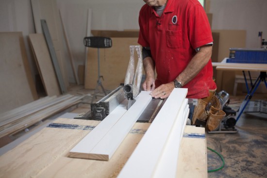 The author rips pieces for the panel frame from wider stock.