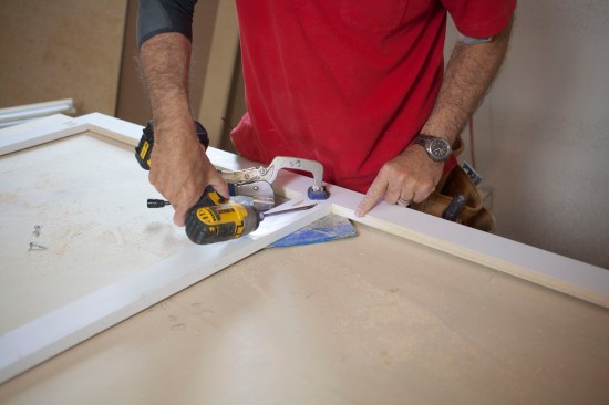 With the frame pieces clamped flush, pocket screws fasten the frame together. 