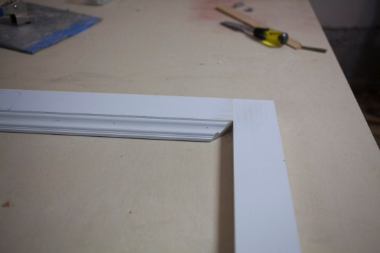 Lengths of panel molding join at the corners with 45° angle miter cuts. 