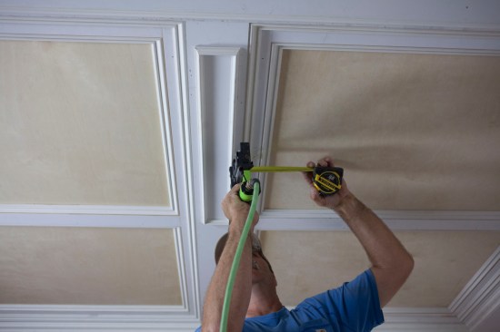 Precise measurements position the trim assemblies perfectly on the minor beam. 