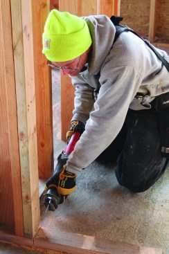 Many framers use a continuous sill when framing interior walls. After the walls are secured in place, a recip saw is the best tool for cutting out the rough sill in the door opening.