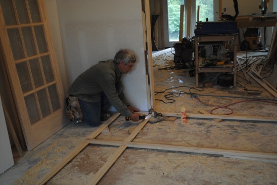 Starting with the longest wall, the author cuts and assembles the frames face down on the floor in front of where they’ll be installed. The frames assemble quickly with pocket-screwed joints, which don’t require long clamps.