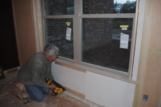To allow the window panel to step out from the side panels, the author pads out the area below the window. 