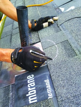 Scribe and fit the shingle courses around the boot in typical fashion.