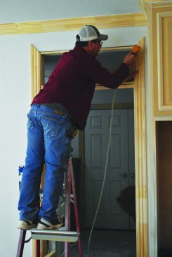 Case the entire door and transom.