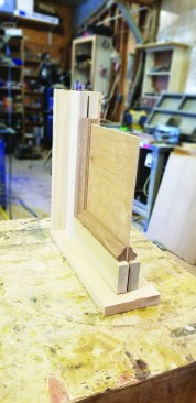 The solid panel option can be built and installed before the box goes in.