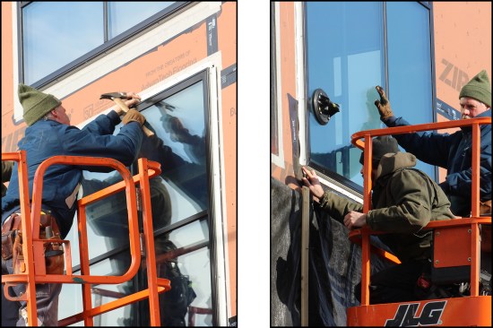 The nailing flanges are nailed off with stainless steel roofing nails (above left). Before the crew installs the vapor-open sill flashing tape, a dab of sealant is applied to each corner to seal the opening where the window frame and nailing flanges intersect (above right).